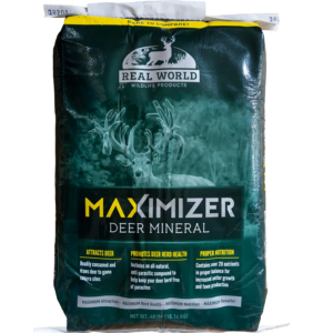 maximizer new - Ideal Land Management | Forestry mowing & mulching, food plots, hunting blinds Deer mineral supplement bag labeled 'MAXIMIZER DEER MINERAL' with a deer graphic and Real World Wildlife Products branding on a green package.